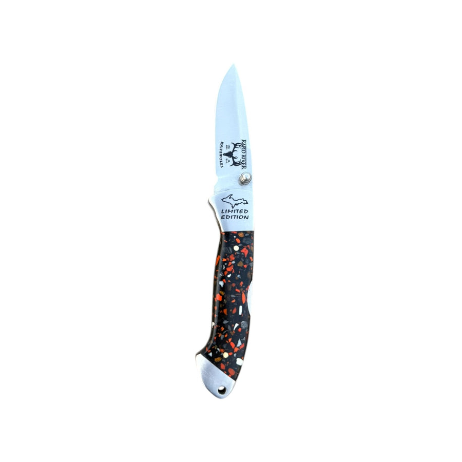Monarch Polyclast Yooper pocket knife 26-556, open with a multicolored handle and Limited Edition blade engraving