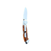 Reverse side of the open Thuya wood Yooper pocket knife 26-559, showing the silver pocket clip and brown wood handle