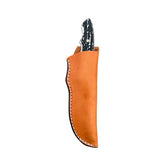 Beavertail Skinning Knife in a tan sheath, with its Elk Antler handle exposed.