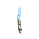 Reverse side of Yooper pocket knife 26-545 with blade open, olive-green and tan box elder burl handle and silver pocket clip
