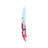 Reverse side of Yooper pocket knife 26-547 with blade open, red dyed box elder burl handle and silver pocket clip