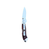 Reverse side of Yooper pocket knife 26-548 with blade open, deep purple box elder burl handle and silver pocket clip