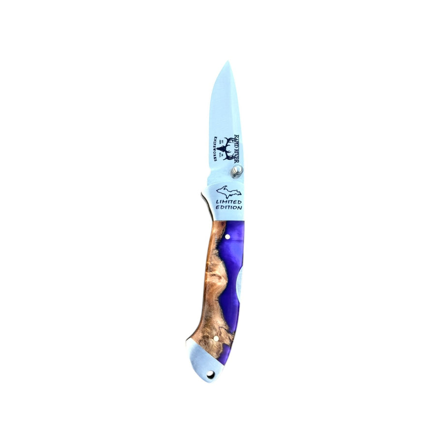 Yooper pocket knife 26-550 with blade open, purple acrylic and tan burl handle, and Limited Edition blade marking.