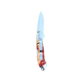 Reverse side of Yooper pocket knife 26-540 with blade open, red, cream and black box elder burl handle and silver pocket clip