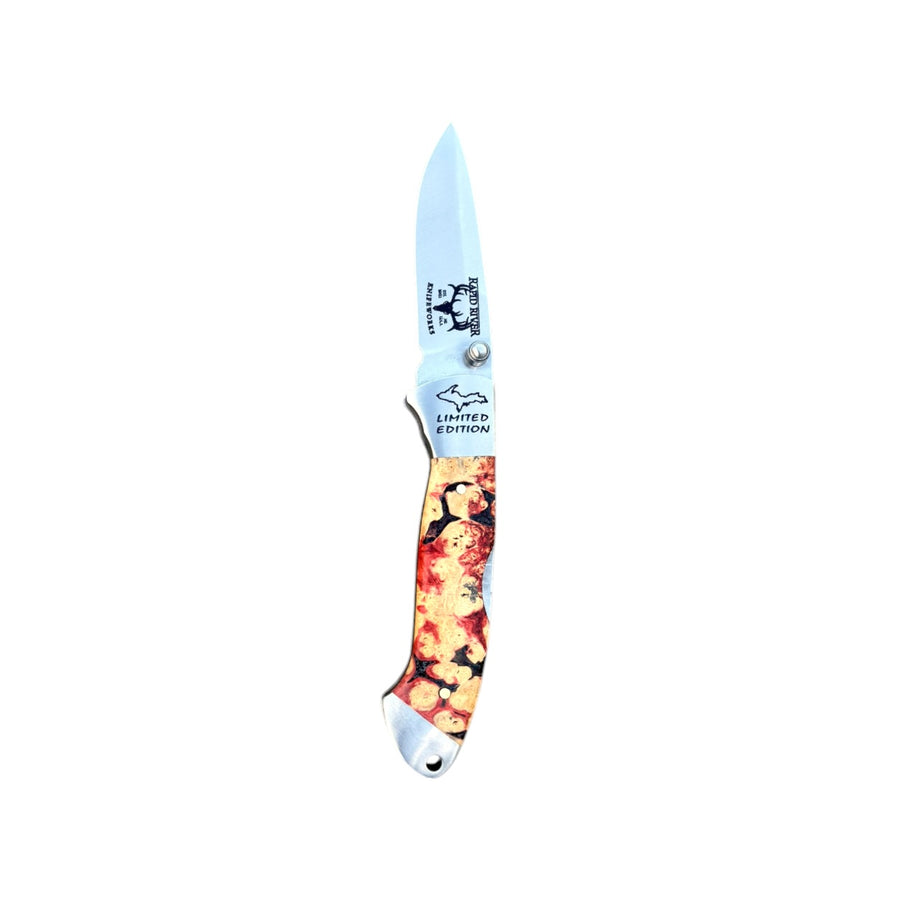 Yooper pocket knife 26-540 with blade open, red, cream and black box elder burl handle and Limited Edition blade marking